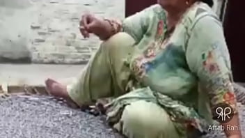 Sizzling Desi Aunty Puffs With Seductive Grace